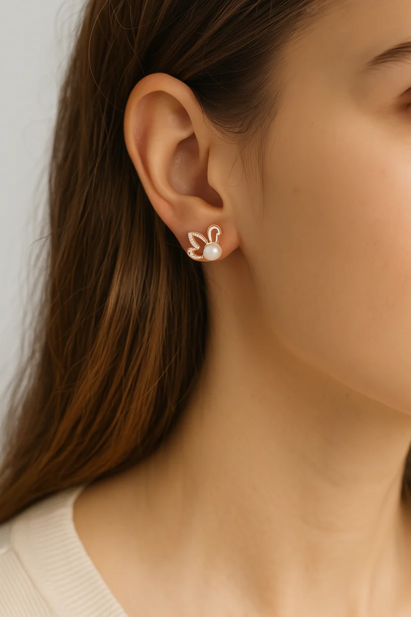 iconic swan pearl studs iconic swan pearl studs