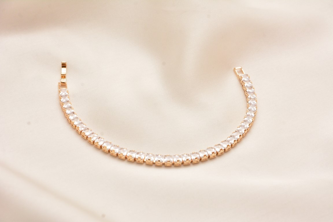 elegant golden tennis bracelet